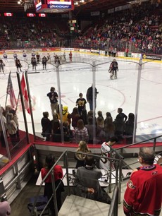 Photo of students singing before BSens game