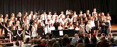 Chorus of young children on a stage