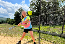 Girl playing softball