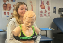 Girl hugging a mannequin