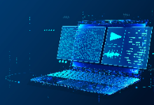 Image of computer and code on a blue background