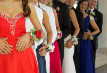 Young people wearing dresses, tuxedos