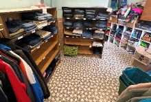 A closet with clothes