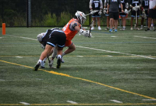 Mason McCombs playing lacrosse