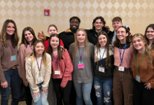 two rows of people posing for a picture