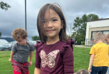 Young girl looking at the camera