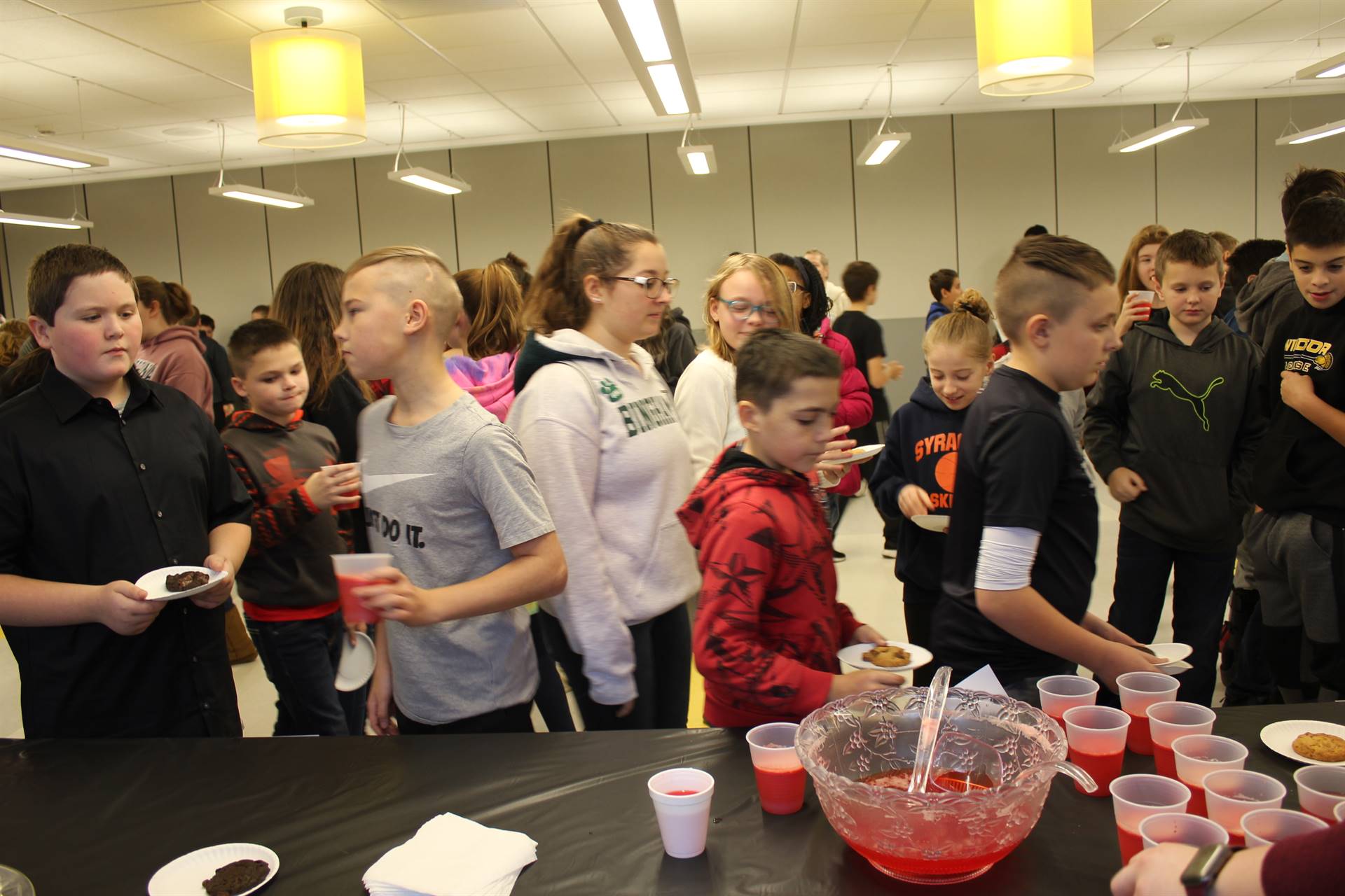 A group of children in a cafeteria