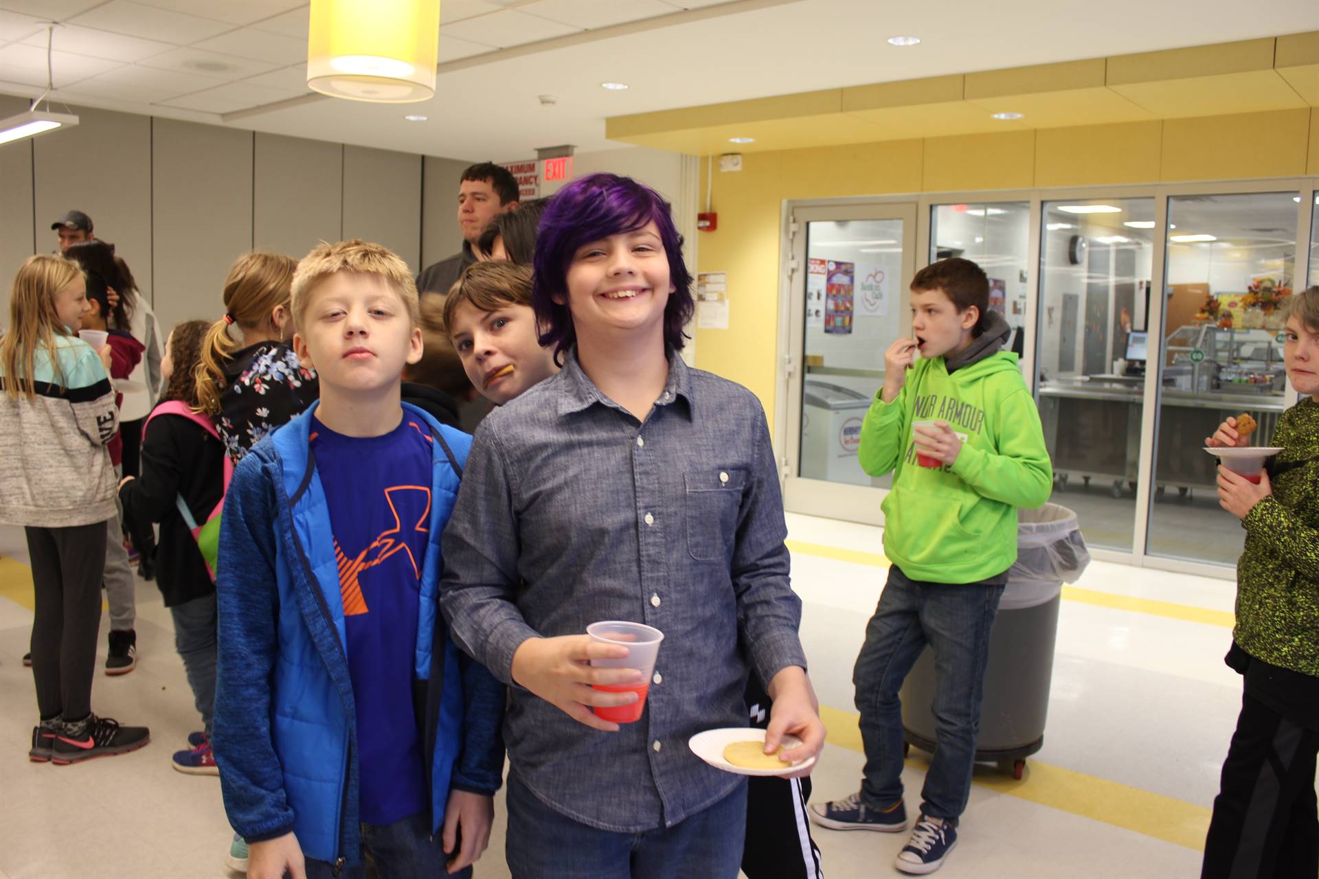 Three boys smiling