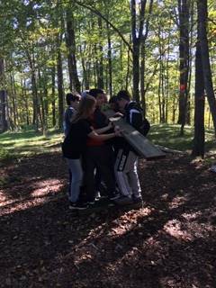 A group of children in the woods