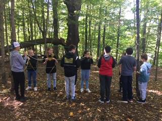 A group of children in the woods