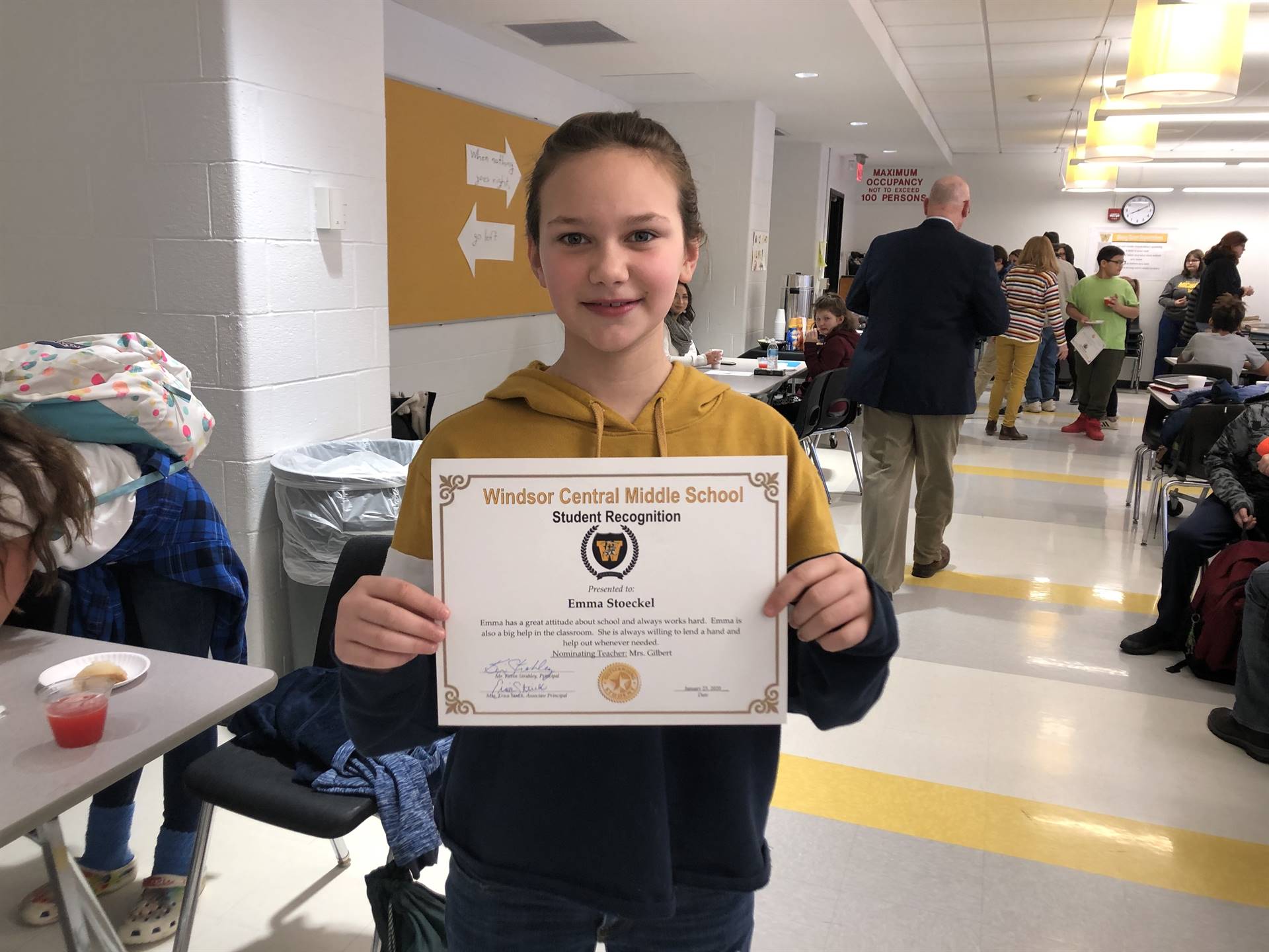 Girl holding a certificate