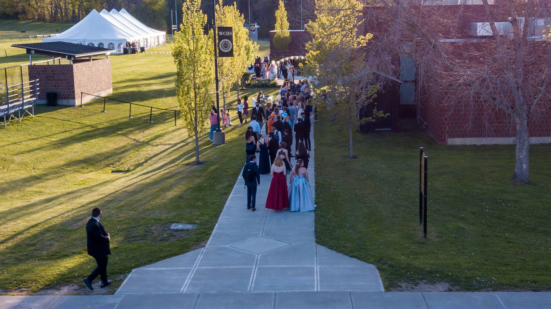 Arial view of prom goers walking outside on WCHS campus