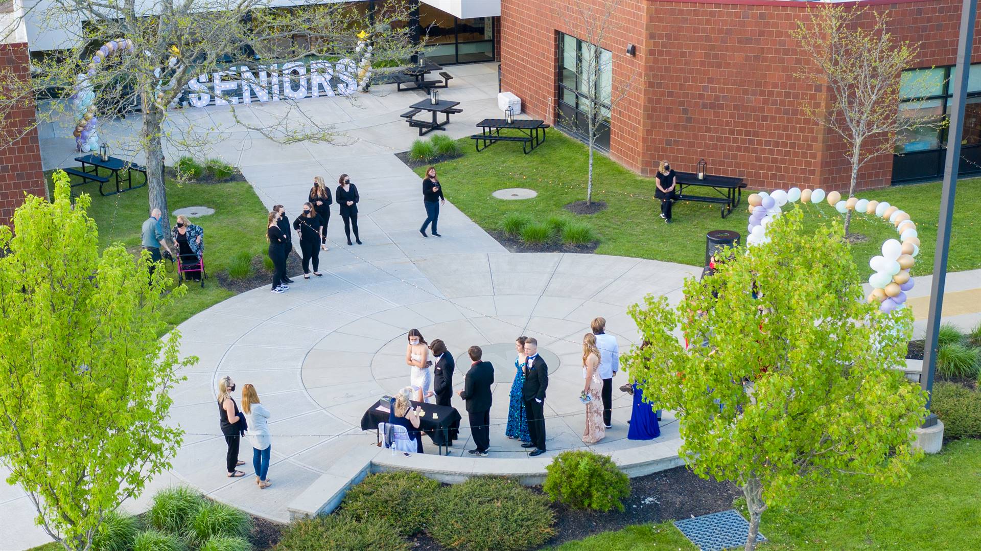 Arial view of high school with students walking