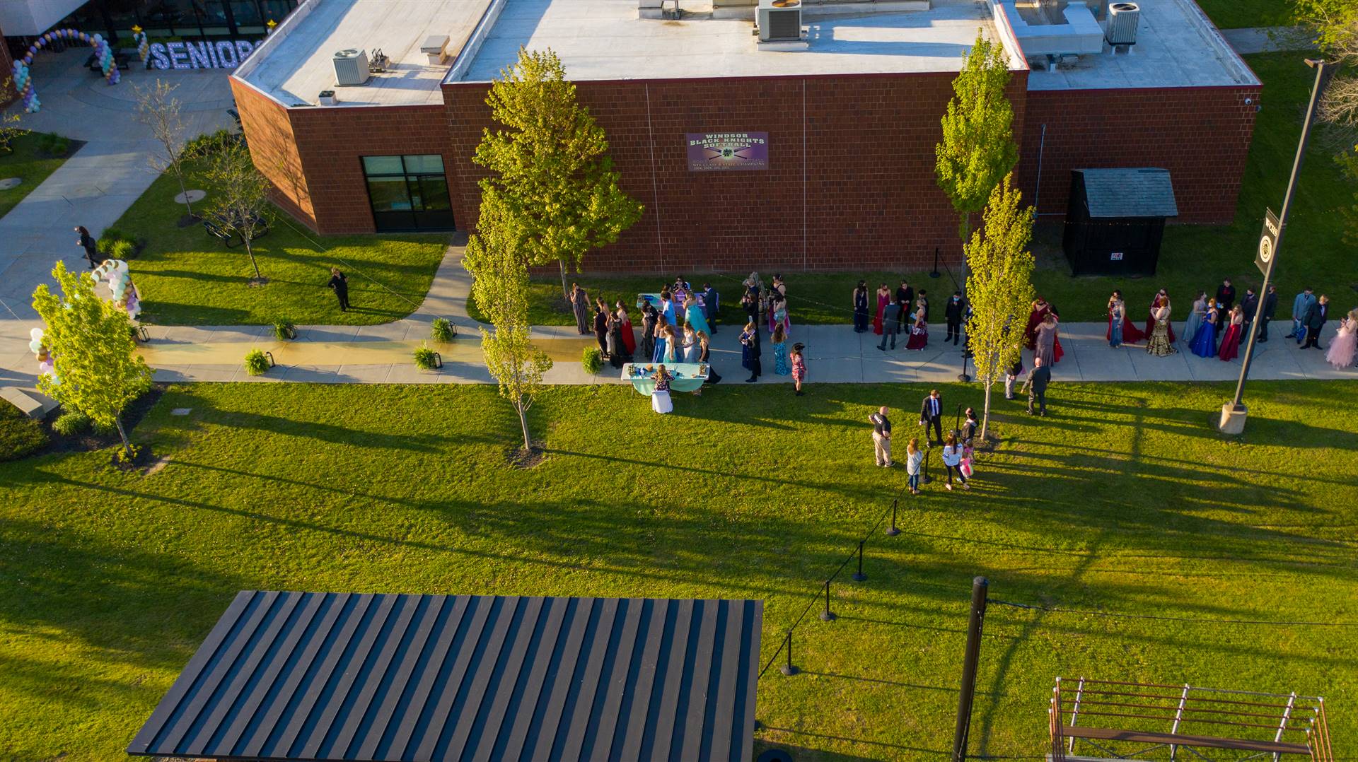 Arial view of high school with students walking